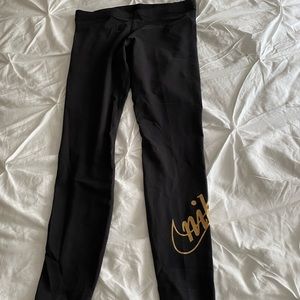 Woman’s NIKE Sportswear Glitter Leggings